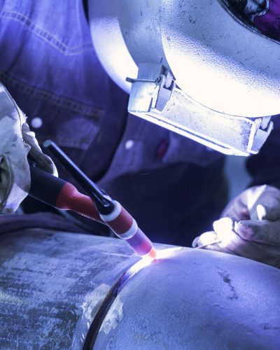 Worker,Welding,Metal,Piping,Using,Tig,Welder/he,Work,In,A